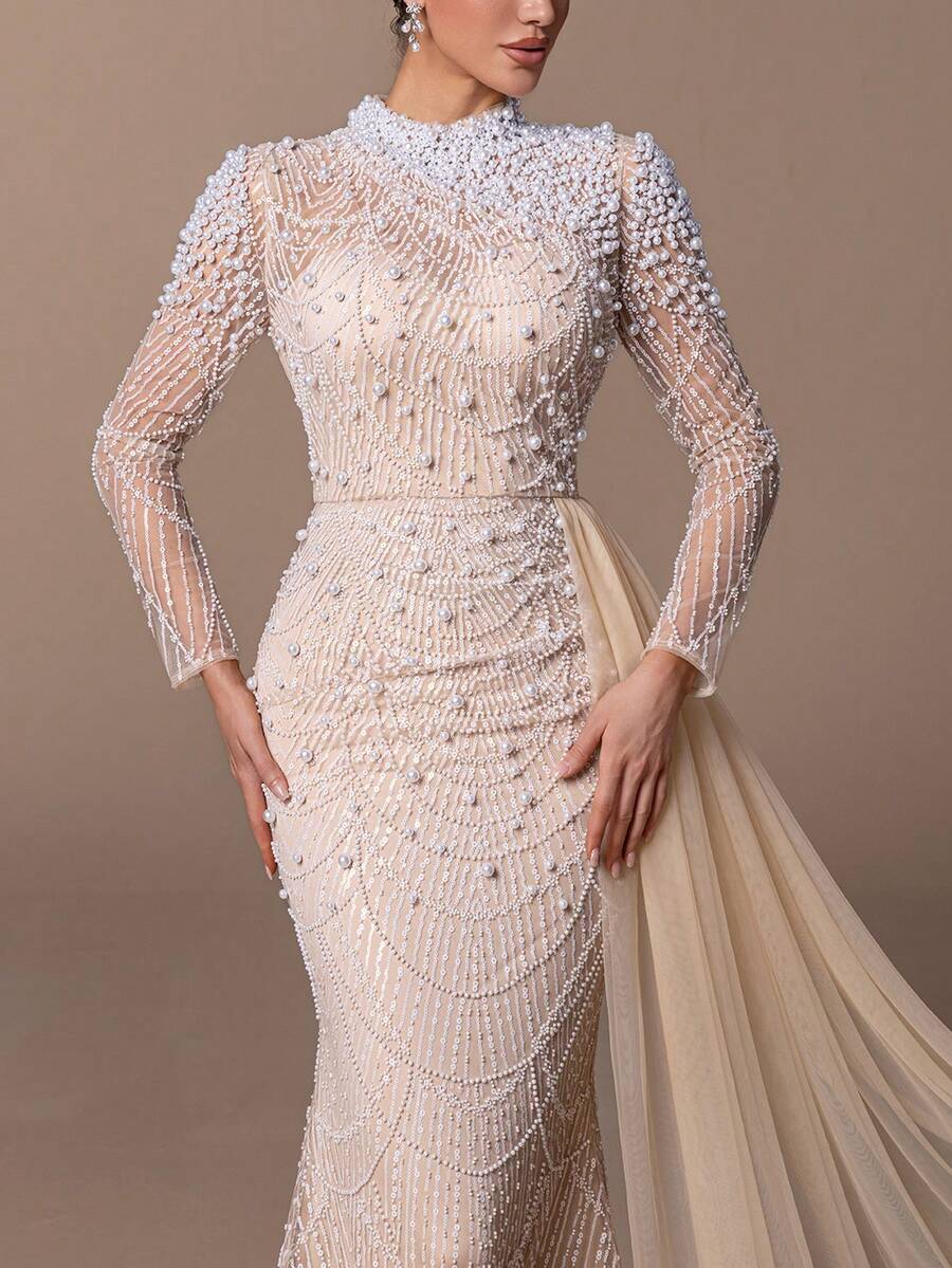 女士优雅立领鱼尾晚礼服，通体珍珠刺绣，可拆卸薄纱拖尾头纱；精致露背正式礼服，饰以精致珠饰和喇叭裙摆；修身婚礼宾客礼服，适合出席黑领结晚宴、盛大晚会、颁奖典礼、红毯活动和正式晚宴。 - 香檳色 - 查看 1
