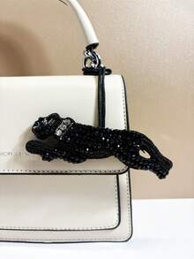 1 pieza Mochila, bolso de hombro, bolso diagonal, bolso de mano, bolso de axila, bolsa de maquillaje u otra bolsa de almacenamiento, colgante de coche, llavero, colgante de cintura, colgante de equipaje, colgante de identificación, hecho a mano con cuentas en negro, plateado y dorado con diseño de leopardo, versátil, divertido e interesante, adecuado para parejas, novias, estudiantes, hombres y mujeres para el trabajo, el transporte diario, citas, vacaciones, viajes, regalos pequeños, cumpleaños, etc.