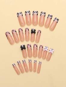 24 Stücke Sarg-förmige Nägel im Y2K-Stil, mit einer zartrosa Basis, die dem Hautton entspricht, mit Elementen wie weißen und rosa French Tips, Kuhprint und schwarz-weißen Schleifen-Accessoires. Die Hälfte sind Jelly-Gel-Nägel und die Hälfte haben strukturierte Streifen. Perfekt als Geschenk für Freunde oder zum Tragen bei Alltags- und Feiertagspartys. - Wassermelonenrosa - Übersicht 3