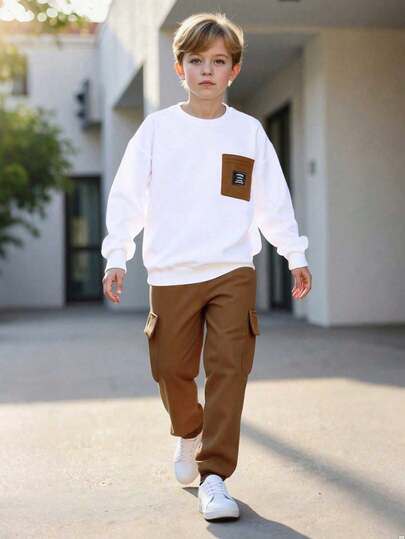 Set de 2 piezas de sudadera de cuello redondo y pantalón casual con bolsillo para niños en primavera/otoño, parte superior de color blanco sólido con mangas, Bottom deportiva, conjunto de moda para adolescentes