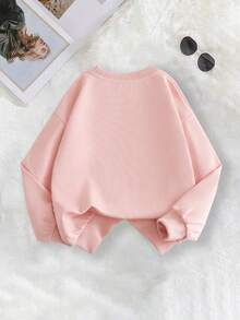 青少年女孩两件套服装，适合少女，设计时尚独特：粉色圆领运动衫，袖子上印有可爱的小熊图案，搭配休闲的松紧腰喇叭裤，饰有字母图案。 - 粉色 - 查看 5