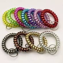 8 piezas Juego de llaveros de bobina de muñeca de superficie brillante y colorida de primavera, brazaletes y llaveros de bobina espiral elástica pequeños y convenientes para llaves, bolsas, mochilas, cordones de teléfono y accesorios cotidianos, surtido de colores aleatorios, acento de moda ligero para uso diario, agrega un brillo colorido a los atuendos, idea de regalo de primavera ideal y actualización de accesorios de temporada - Multicolor - Ver 1