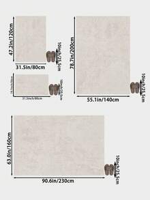 1块白色半圆形图案装饰地毯，绒面材质，厚度10毫米，触感柔软舒适，易于保养，防水，防滑底背，适用于大堂、卧室、客厅、浴室、厨房、餐厅等场所。