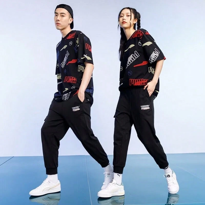 Pantalones de chándal sueltos con cordón de ajuste de Puma, unisex, 534121-01 - Negro - Ver 1