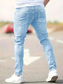 男式修身破洞弹力休闲紧身牛仔裤