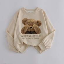 少女长袖圆领套头衫，饰有“惊喜时刻”小熊印花图案，秋冬款