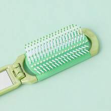 Miniso 1 pieza Espejo plegable con peine de peluche de Las Chicas Superpoderosas, compacto y portátil, hecho de plástico de alta calidad, diseño de espejo y peine en uno, muy conveniente para el maquillaje y el peinado diario - Verde - Ver 4