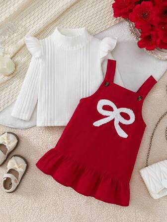 Conjunto de 2 piezas para niña bebé: Blusa de punto blanca de manga larga con rayas verticales y cuello redondo, y vestido rojo de tirantes ajustables con lazo y bordado floral en el bajo, para primavera/otoño