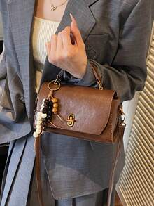 Bolso cuadrado pequeño de moda otoño 2025 para mujer, bolso bandolera retro, bolso de hombro con textura única estilo coreano con colgante