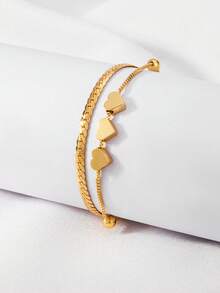 1 chiếc vòng tay kiểu dáng nhiều lớp thời trang , được giới trẻ ưa chuộng. - Vòng tay trái tim - Xem 2