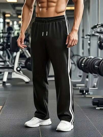 男士双条纹运动裤，纯色简约设计，直筒慢跑裤，运动自如，适合健身和跑步，是日常穿着和运动的理想选择，适合学生和男孩。