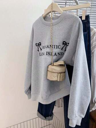 Damtröja med rund hals och lös passform