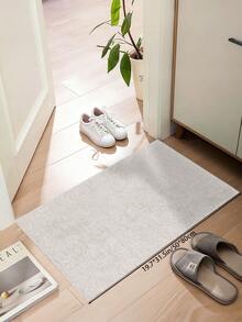 1块白色半圆形图案装饰地毯，绒面材质，厚度10毫米，触感柔软舒适，易于保养，防水，防滑底背，适用于大堂、卧室、客厅、浴室、厨房、餐厅等场所。