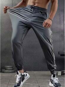 Men's Stretchy Drawstring Training Pants With Zippered Pockets – Quick Dry - Grey - View 2
