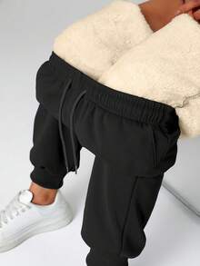 女士户外运动裤，抓绒慢跑裤，柔软亲肤面料，弹性腰带，带口袋，适合户外活动、运动、骑行、徒步，也是送给闺蜜的时尚必备单品。紧身版型 - 黑色 - 查看 2