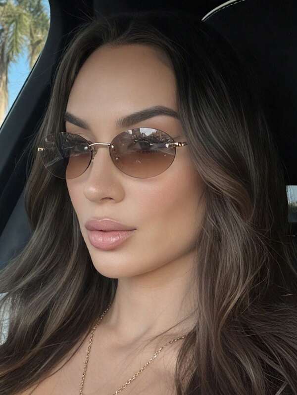 1 par de gafas de moda con marco metálico sin montura y borde ovalado de color marrón, adecuadas para uso diario