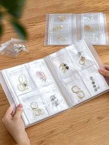 1 pieza Álbum de almacenamiento de joyas transparente y mate con 30 bolsas de almacenamiento antioxidantes, libro de almacenamiento de joyas, organizador de bolsas selladas, caja de almacenamiento de viaje para anillos, aretes, collares y otros accesorios, regalo de regreso a clases, regalo de viaje