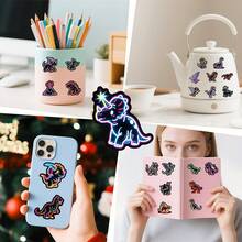 1pc/25pcs Neon Glow In The Dark Dinosaur Stickers - Self-Adhesive Reusable No Residue, No Power Needed, Multicolor Luminous Flashing Effect, Asymmetrical Shapes And Glossy Finish, Suitable For DIY Crafts, Scrapbooking, Laptops, Water Bottles, Fridges, Guitars, Etc. - Cute Cartoon Dinosaur Decorative Stickers, Suitable For Teens, Fridge Decor, Scrapbooking Supplies, Fun Design, Durable Vinyl, High-Quality Printing, Glows In The Dark, For Various Projects