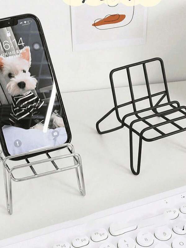 1pc Stylish Mini Chair Shaped Phone Holder, Unique Vertical Design For Desk Or Home Use, Durable Metal Wire Display Stand, Perfect For Organizing Your Space, Ideal Gift For Students And Professionrendy Accessory For Modern Workspaces, Enhances Aesthetic Appeal, Great For Holiday Gifting, Versatile Use In Offices, Living Rooms, And Bedrooms, Elevate Your Phone Display With This Chic And Functional Stand, Must-Have Item For Tech Lovers And Design Enthusiasts, Perfect For Video Calls, Streaming, And Hands-Free Viewing, Add A Touch Of Elegance To Your Desk Setup.