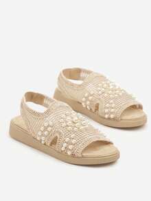 Sandali piatti casual, comodi e versatili da donna, adatti per l'estate