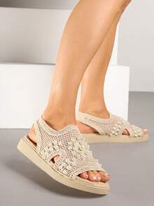 Sandali piatti casual, comodi e versatili da donna, adatti per l'estate