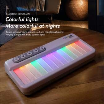 لعبة بيانو صغيرة للأطفال، لوحة مفاتيح إلكترونية موسيقية مضيئة بألوان نمط ، أنماط إضاءة، تشغيل موسيقى باللمس، تبديل أنماط الآلات بلمسة واحدة، لوحة مفاتيح محمولة لعبة موسيقية للمبتدئين، هدية تعليمية مثالية لعيد الميلاد للأولاد والبنات من عمر 3-12+ سنة