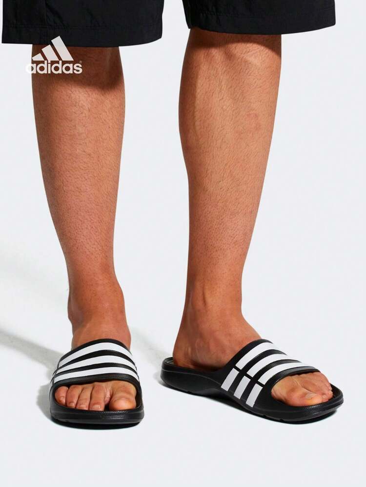 Adidas 阿迪达斯 DURAMO SLIDES 休闲游泳拖鞋，EVA 一体式简约设计，适合运动前/运动后穿着，纹理鞋垫 - 黑色 - 查看 2