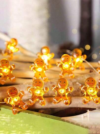 1 pièce Guirlande lumineuse en forme d'homme en pain d'épices de Noël, alimentée par pile, convient pour les décorations de Noël et d'hiver. Une lumière décorative enroulable pour sapin de Noël, convenant pour les salons, chambres à coucher et salles à manger intérieurs. Convient également pour être suspendue dans les vitrines de magasins, les cheminées, les décorations d'escalier, les porches extérieurs et les décorations de jardin, l'éclairage d'ambiance des fêtes de Noël, et comme un beau cadeau de Noël.