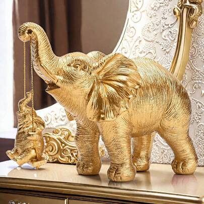 Tượng voi vàng, biểu tượng cho may mắn, sức khỏe và sức mạnh. Món quà lý tưởng cho phụ nữ, các bà mẹ. Là vật trang trí, đây là món quà tuyệt vời cho Giáng sinh, Ngày lễ tình nhân, Năm mới và các ngày lễ khác. Quà tặng cho bạn bè.