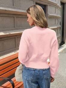 Nuevo cárdigan de unicolor para mujer de otoño e invierno, de estilo simple y casual, con cuello redondo, manga larga, pespunte de punto y botón con forma de corazón de durazno, estilo universitario, nueva prenda de punto para Año Nuevo