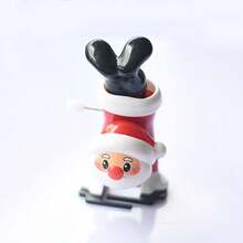 1/4 piezas Juguetes a cuerda navideños para niños, regalos de fiesta, set de 4 paquetes de juguetes de fiesta navideña, juguetes de cuerda novedosos que caminan y saltan, relleno de bolsas de regalo y obsequios divertidos para la fiesta de Navidad