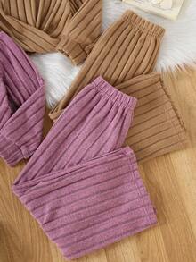 Conjunto de 4 piezas de top corto acanalado de unicolor y pantalones acampanados para niñas, atuendo casual y cómodo para otoño/invierno