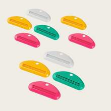 10 piezas Exprimidor de pasta de dientes montado en la pared de color aleatorio, soporte para pasta de dientes de baño para muestras cosméticas, sin necesidad de electricidad