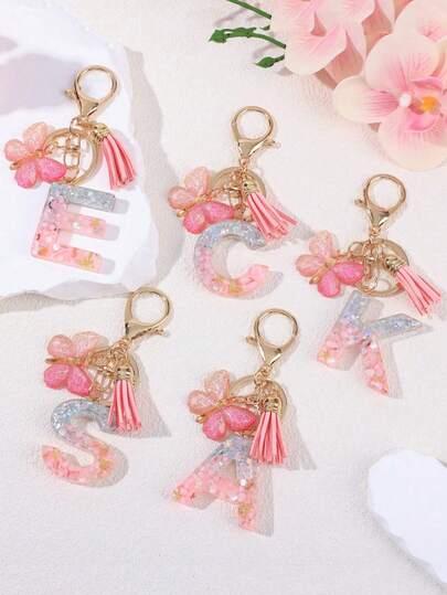 Llavero personalizado con brillo y monograma para mujeres - Dije de letra de resina con brillo plateado, piedra rosa y estrella dorada con agitador - Regalos de cumpleaños para ella, regalo de aniversario con borla rosa y acento de mariposa Accesorios de coche, dije de bolso, accesorios escolares, gótico lindo Y2k