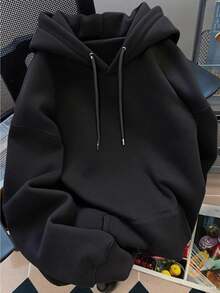 Sudadera unisex casual con bolsillo tipo canguro, capucha y cordón ajustable, estilo holgado, cuello redondo, manga larga, ideal para otoño e invierno, perfecta para uso diario - Negro - Ver 1