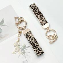 1个锌合金钥匙扣，印花PU皮革设计，带闪亮皇冠字母吊坠，防锈涂层，适合悬挂车钥匙、钥匙等。用途广泛，必备单品！ - 彩色 - 查看 12