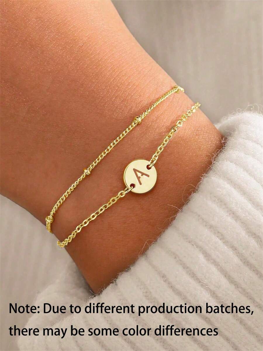1pc Elegant Minimalist Stainless Steel Hollow 26 Letter Pendant Double Layer Adjustable Chain Bracelet, Fashionable Jewelry Gift For Women, Girlfriend, Wife, Mother, Family, Friends, Birthday, Anniversary (Note: Due To Different Production Batches, There May Be Some Color Variations)