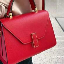 Handteller-Tasche, strukturierte Optik, rosé Farbton, eleganter und vielseitiger Stil