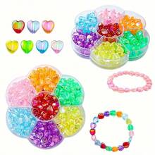 Un set de 140 piezas de cajas con flores de ciruelo en varios colores de cuentas dispersas de estrella de cinco puntas de color acrílico AB, utilizadas para hacer accesorios de joyería DIY para cadenas de teléfonos móviles