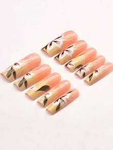 24 piezas Juego de uñas postizas en forma de ataúd, con un estilo liso y un degradado de amarillo brillante a flores con hojas verdes, kit de manicura de cobertura acrílica completa, perfecto para suministros de arte DIY. Incluye un trozo de pegamento de gelatina y una lima de uñas, adecuado para uso diario, fiestas, baile y como regalo.