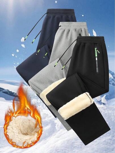 Pantalon long d'extérieur décontracté pour hommes en hiver avec doublure en polaire, avec cordon de serrage à la taille et poches zippées avec imprimés sur les deux côtés. Ils conviennent pour la course en extérieur, les sports, les voyages et autres activités.