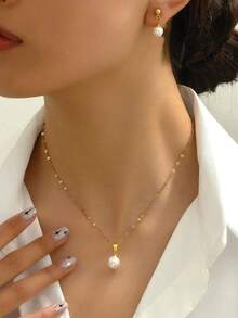 1 Set Elegant And Timeless Stainless Steel Women's Jewelry Set. This Jewelry Set Has A Classic And Luxurious Style, Available In Gold And Silver Colors. The Necklace Features A Delicate Chain And A Round Bead Pendant, While The Earrings Have Round Beads Suspended On A Gold-Tone Component With Secure Earring Backs. Suitable For Daily Wear To Add A Refined Touch. Ideal For Weddings, Anniversaries, And All Seasons.