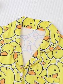 Set de 2 piezas de ropa de dormir para mujer de talla grande con estampado de pato lindo, que incluye camisa de manga larga con cuello y botones, y pantalones con cintura elástica suave. Conjunto elegante para uso diario, pijama para fiestas de vacaciones, ropa cómoda para estar en casa.