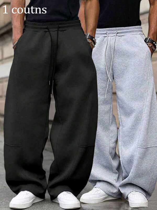Pantalones anchos y sueltos para hombres, diseño de unicolor con detalles de cordón, pantalones de chándal de estilo casual y largo, adecuados para uso diario, trotar y otras ocasiones, artículo versátil para las temporadas de primavera y otoño