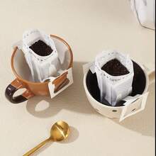 50 piezas Bolsas de filtro de café de goteo manual portátiles, Papel de filtro de café de oreja colgante, Bolsas de filtro de polvo de café de goteo manual, Bolsas de filtro gruesas, Bolsas de filtro de café de goteo de oreja colgante, Bolsas de filtro de goteo manual, Bolsas de café de goteo manual desechables, Bolsas de embalaje de polvo de café de papel de filtro desechable de oreja colgante