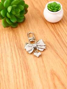 1pc Silver Alloy Bow & Heart Shaped Women Bag Charm, Wallet Accessory, Minimalist Punk Style, Suitable For Outings, Women's Gift, Girlfriend Birthday/Christmas Gift, Wallet Decor & Chain, Bag Pendant, Teacher Accessory