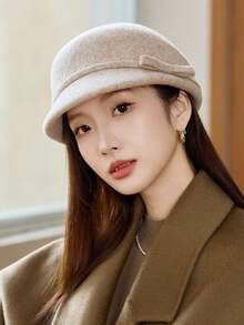 1 件优雅女士贝雷帽，精致蝴蝶结装饰，复古风格小巧迷人。采用优质保暖羊毛材质，与外套完美搭配，散发复古时尚气息。适合日常佩戴、主题公园、摄影等场合。 - 多色 - 查看 12