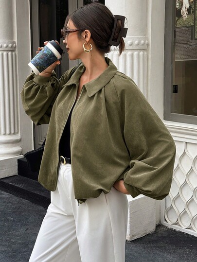 Giacca da donna con maniche a palloncino, cerniera e pieghe, tinta unita