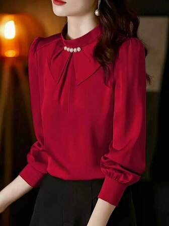 Blusa de satén elegante de manga larga para mujer con cuello de lazo y decoración de botones de perla, corte holgado, unicolor, fácil cuidado, versátil para la oficina, reuniones de negocios y uso diario, adecuada para todas las estaciones