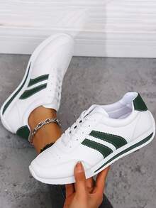 New Fall 2025 Women's Skate Shoes: Stylish And Versatile, These Shoes Feature A Two-Tone Stripe Design, A Subtle Wedge Heel, And Breathable Construction. They're The Perfect Casual Sneaker For Your Preppy Back-To-School Look, A Must-Have For Women's Fall Fashion, And Perfect For Halloween When Paired With A Dress.